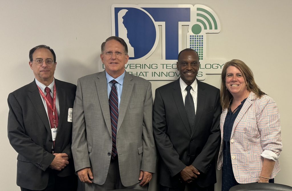 Bryan Sullivan, Chuck Clark, CIO Greg Lane and Representative Krista Griffith at the first meeting of the Delaware Artificial Intelligence (AI) Commission